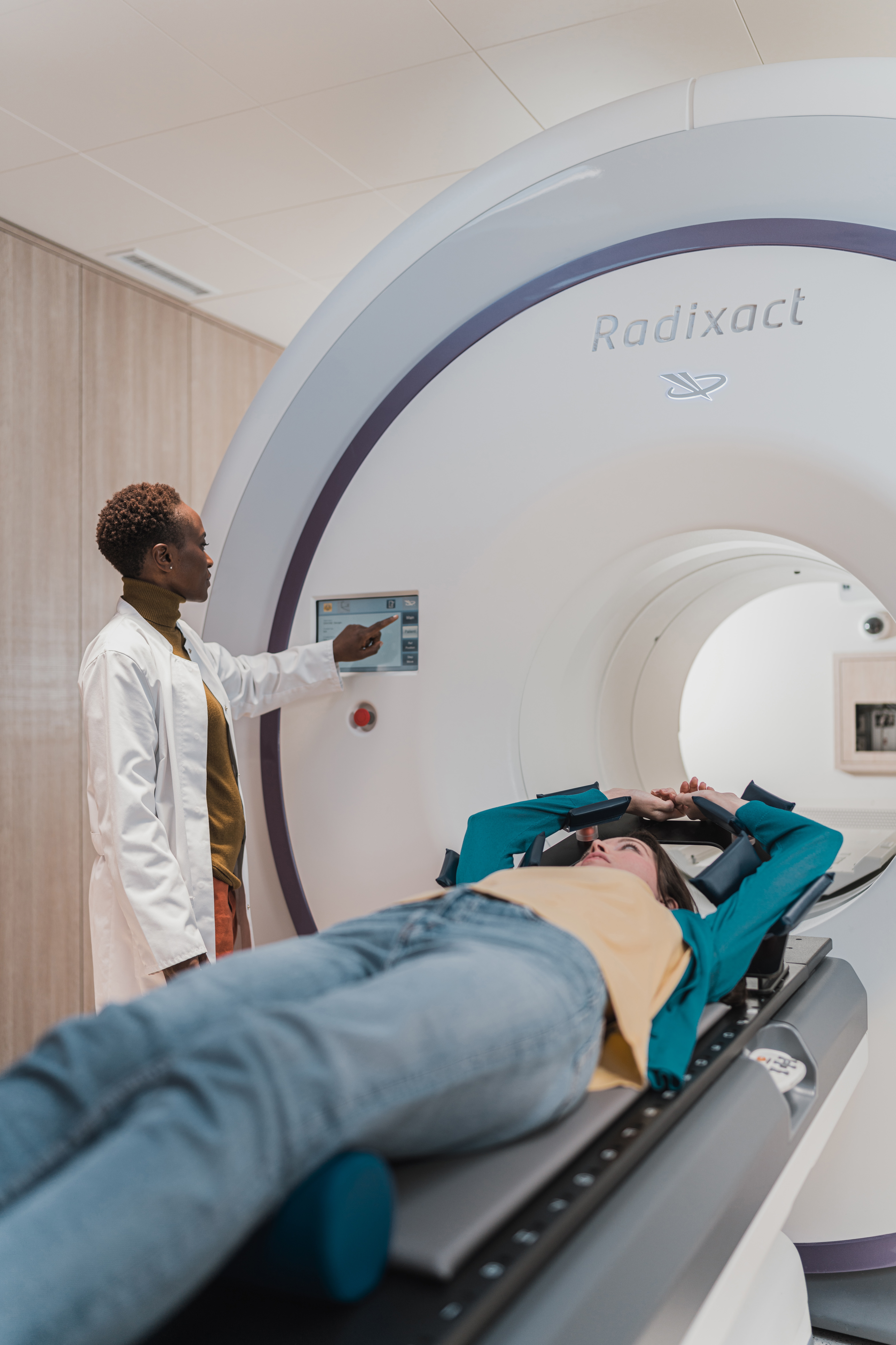 doctor and patient at MRI machine