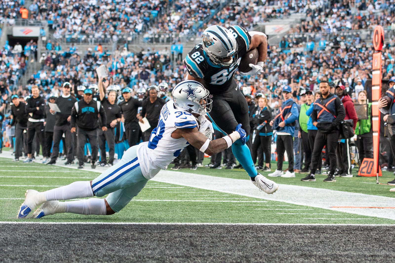 Tommy Tremble scores against the Dallas Cowboys