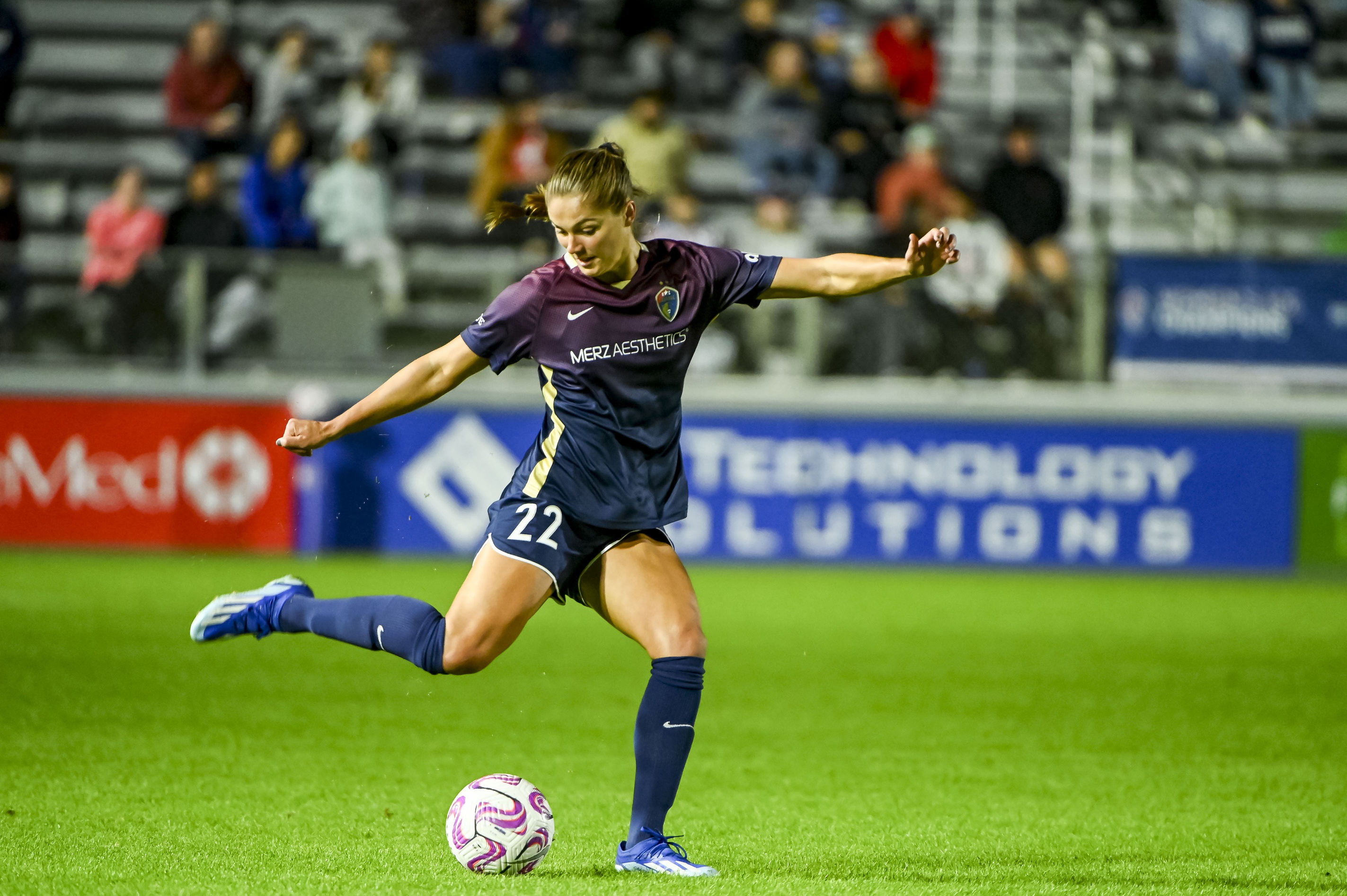 Mille Gejl kicks a soccer ball downfield at Wake Med Park in Cary, NC