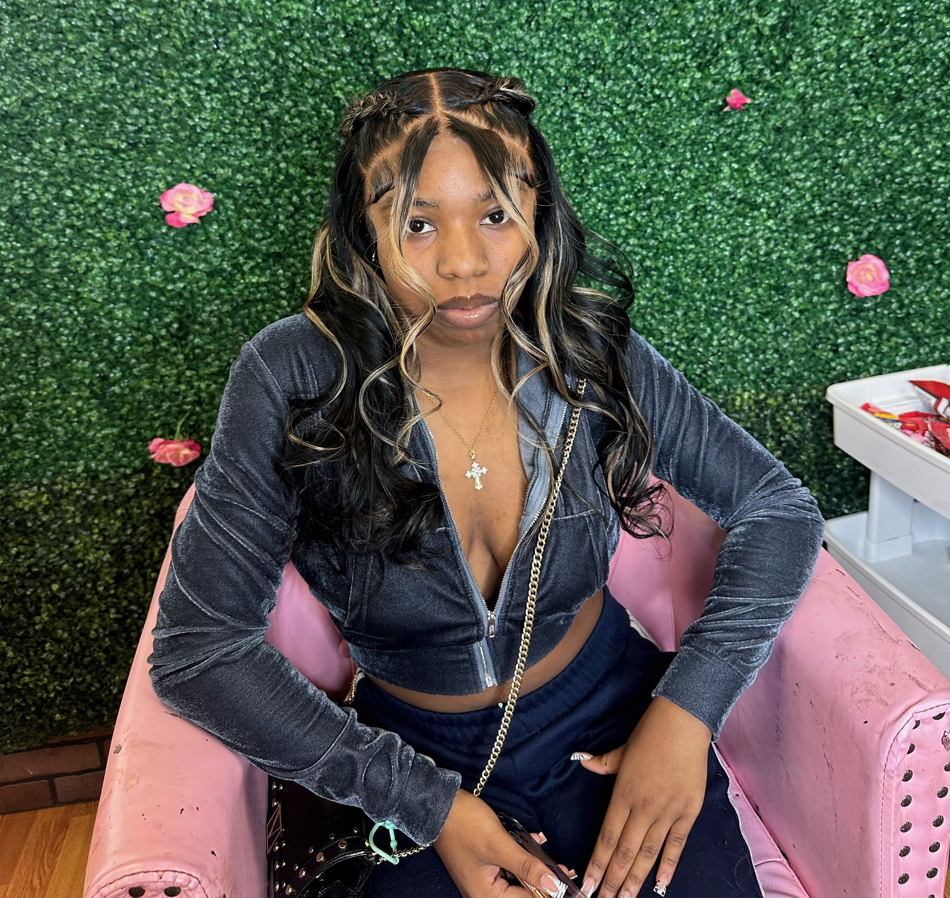 A client shows off Hopewell High School senior Brooklyn Ferguson&rsquo;s work as a hairstylist. 
