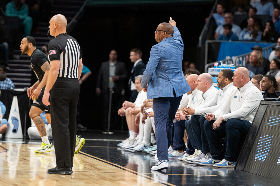 North Carolina basketball coach Hubert Davis points during a a game at Spectrum Center in Charlotte