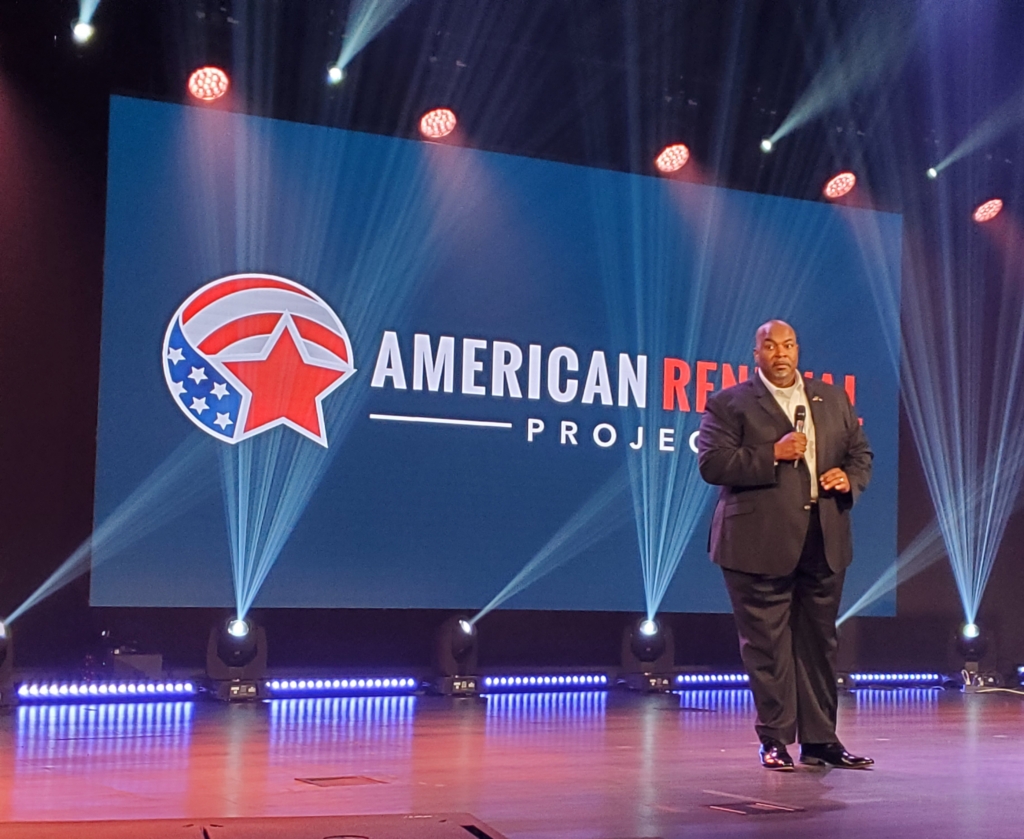 Mark Robinson stands on stage at North Carolina Renewal Project event