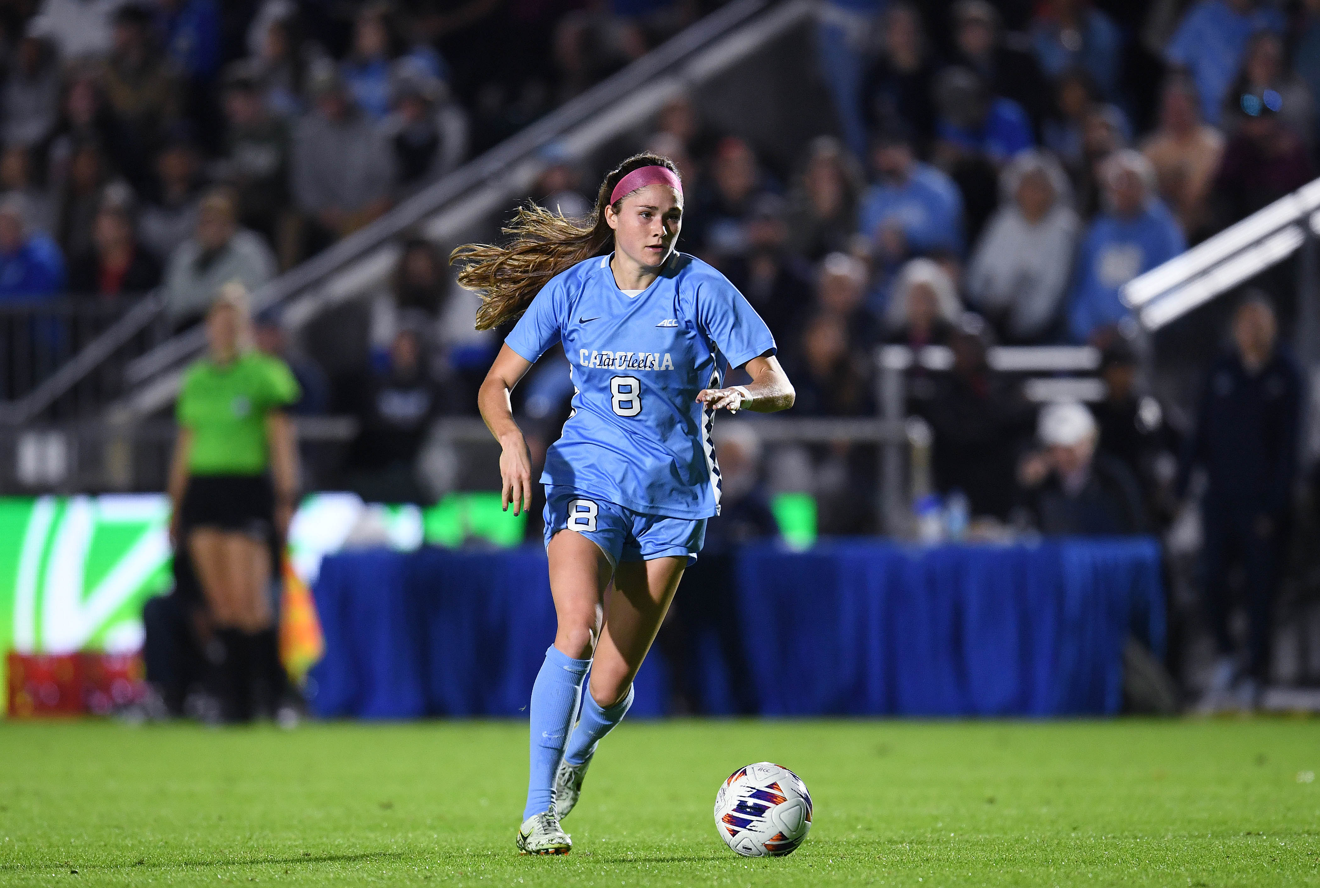 Emily Moxley kicks the ball downfield for the North Carolina Tar Heels