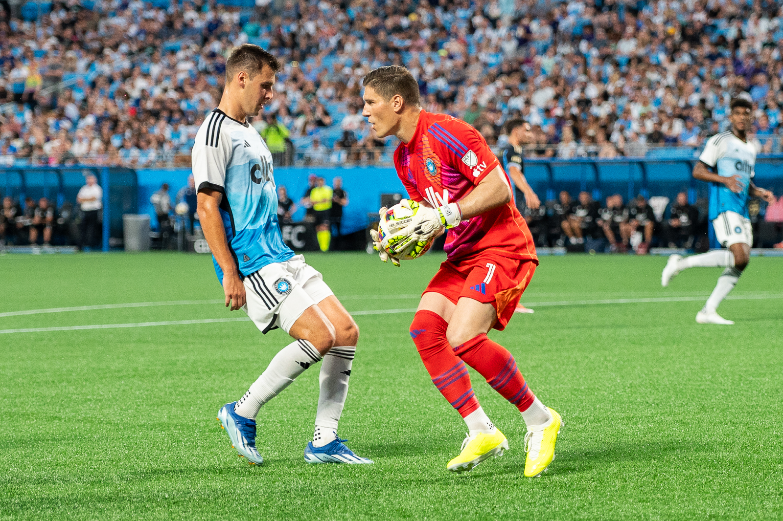 Charlotte FC goalkeeper Kristijan Kahlina holds the ball after stopping a shot