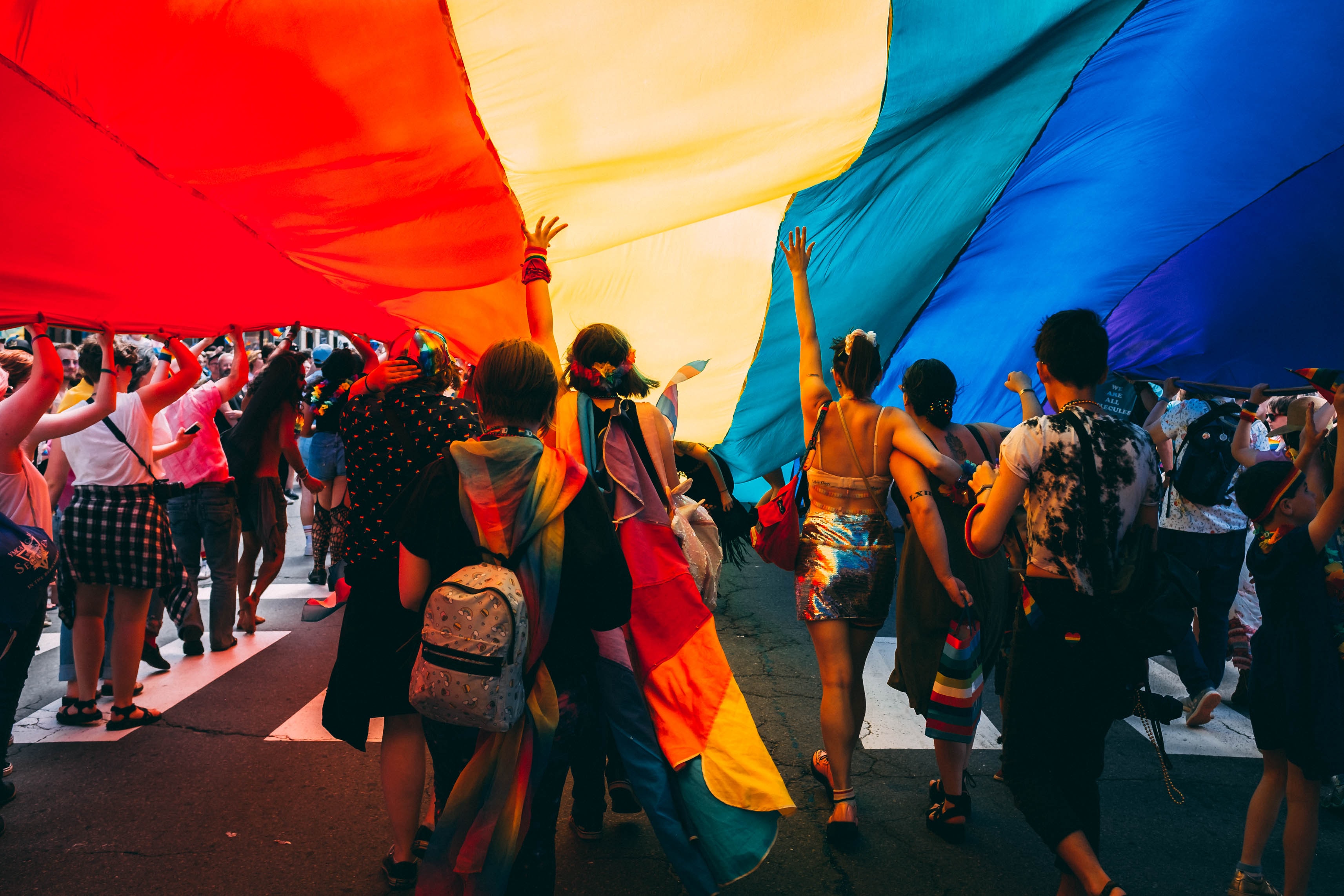 Pride flag on display at a march