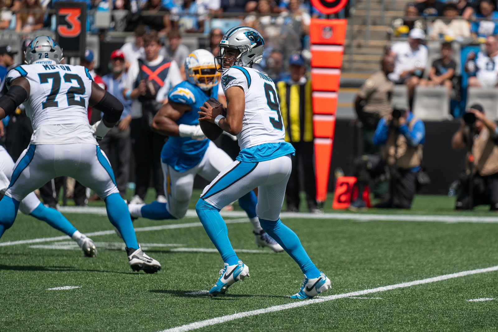 Carolina Panthers quarterback Bryce Young looks downfield for a receiver