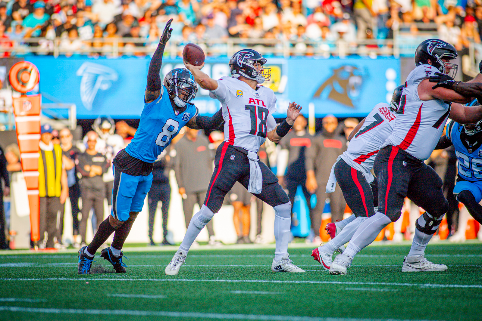 Carolina Panthers cornerback Jaycee Horn rushes Kirk Cousins